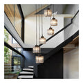 Solution lumineuse Noir et Transparent au dessin sobre en format suspension E27