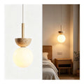 Suspension Ambre et Vert a presence elegante et lumiere agreable