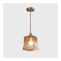 Solution lumineuse Ambre au dessin sobre en format suspension 60 W