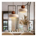 Suspension Ambre et Marron aux lignes epurees avec eclairage confortable